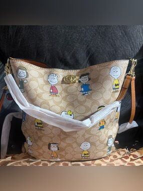 Camel-inspired Signature Canvas bag with multicolored cartoon prin